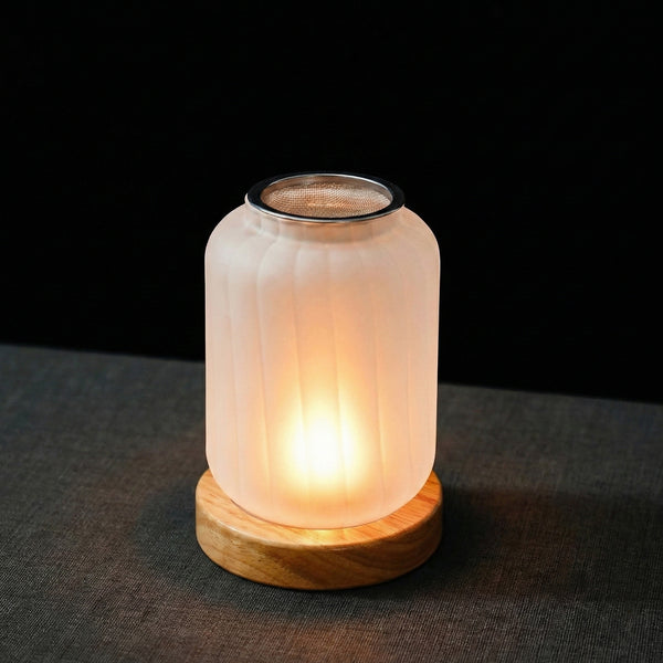 Wispoak Lantern Warmer with Sandalwood chips releasing fragrance vapor