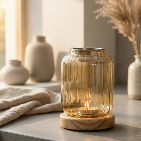 Wispoak Lantern Warmer lifestyle shot on a coffee table with warm ambient lighting